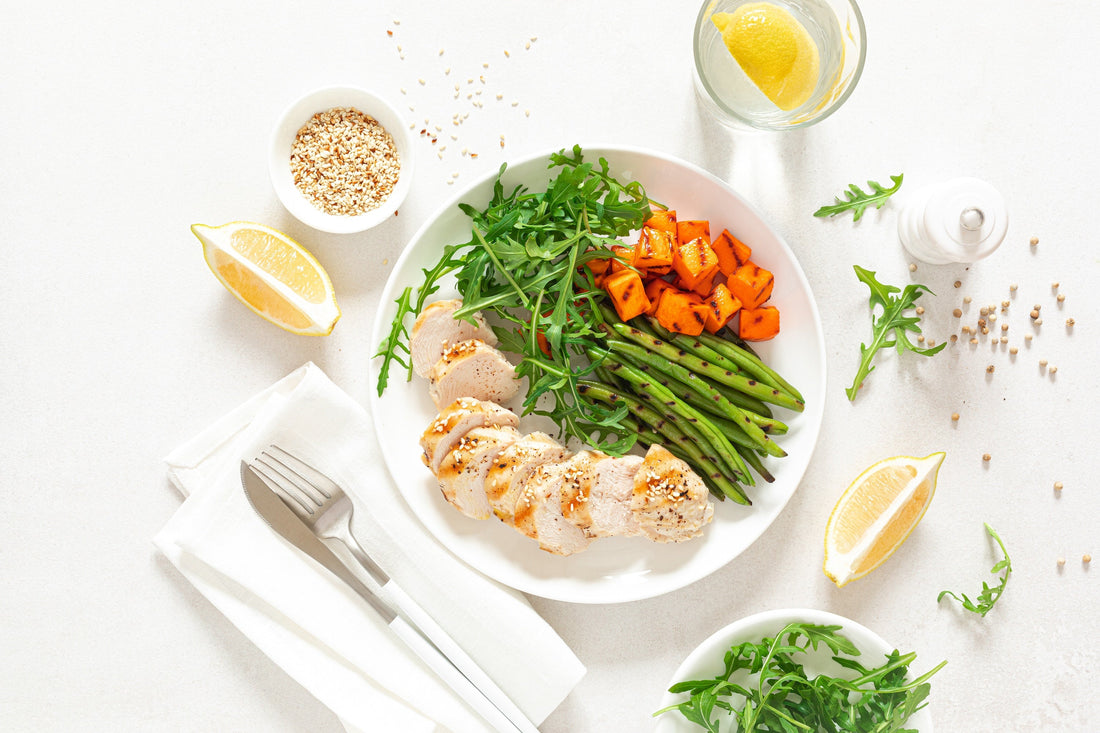 a grilled chicken breast filet on a white background